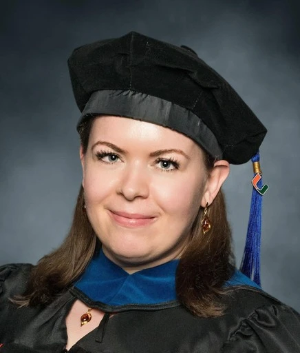 Laura Vasquez Bass in her doctoral cap and gown